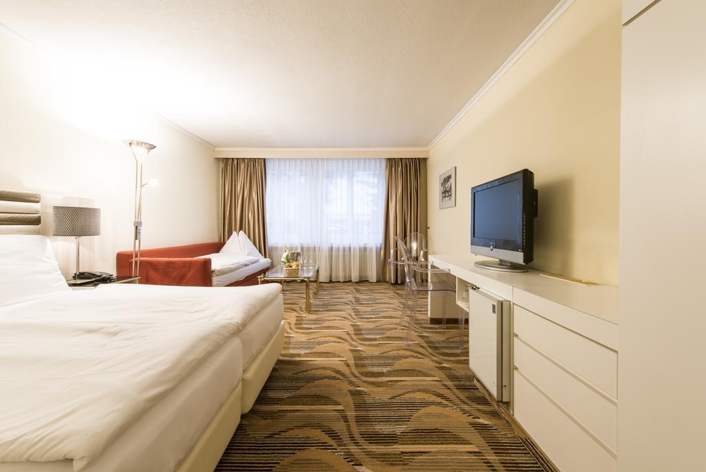 Posthotel Holiday Villa Arosa Buitenkant foto